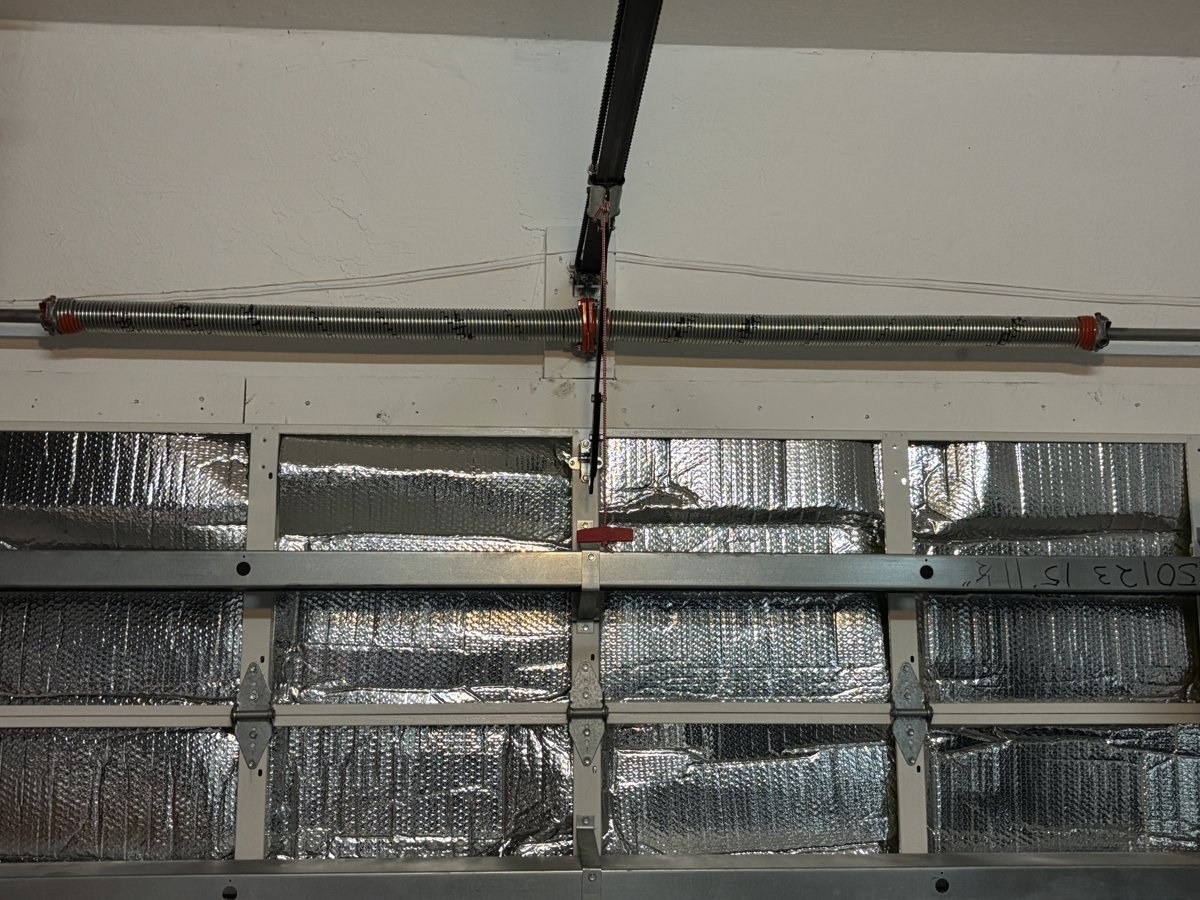 Chain drive opener being mounted to the ceiling bracket